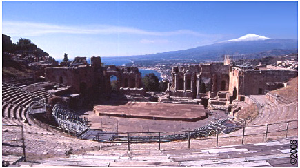 Greco-Roman amphitheatre with Etna and the sea in 
the background.