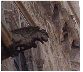 Gargoyle overlooking Palermo's Via Alloro.