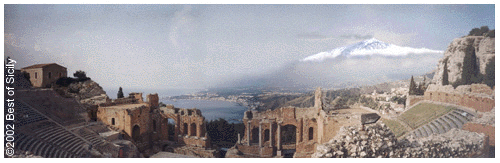 Greco-Roman amphitheatre with Etna and the sea in the background.
